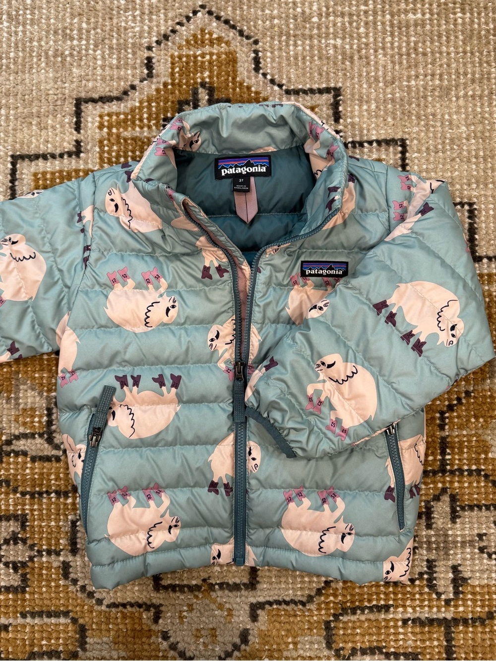 Patagonia Kids Light Teal Puffer Jacket with Buffalo Print